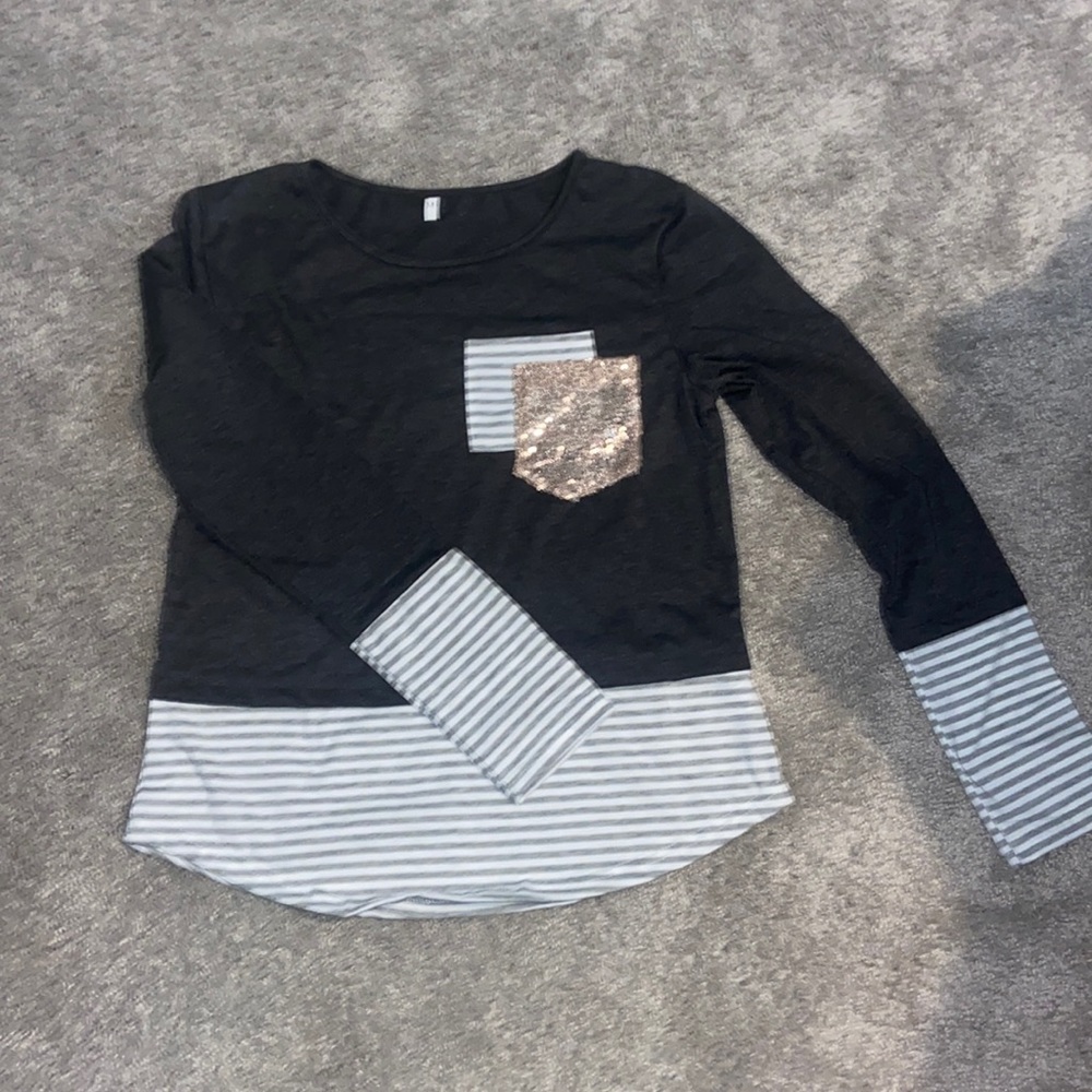 Long sleeve size medium womens shirt.